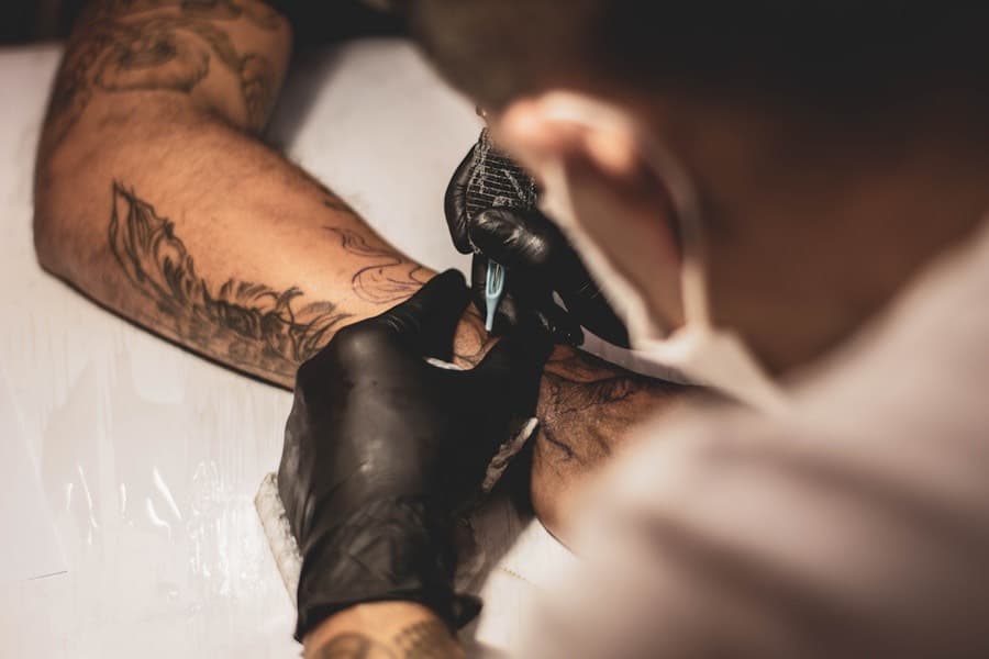Mara Vane, tattoo artist at BLACKWICK, at work